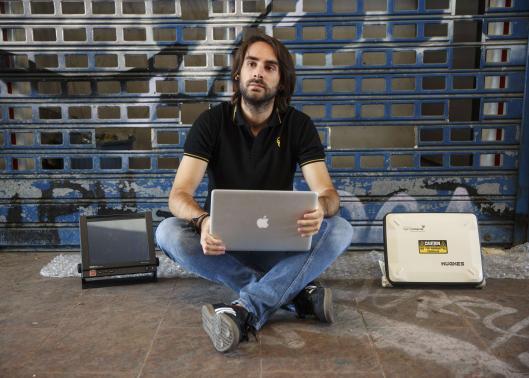 Cybersecurity researcher Ruben Santamarta poses for a photo in Coslada, near Madrid