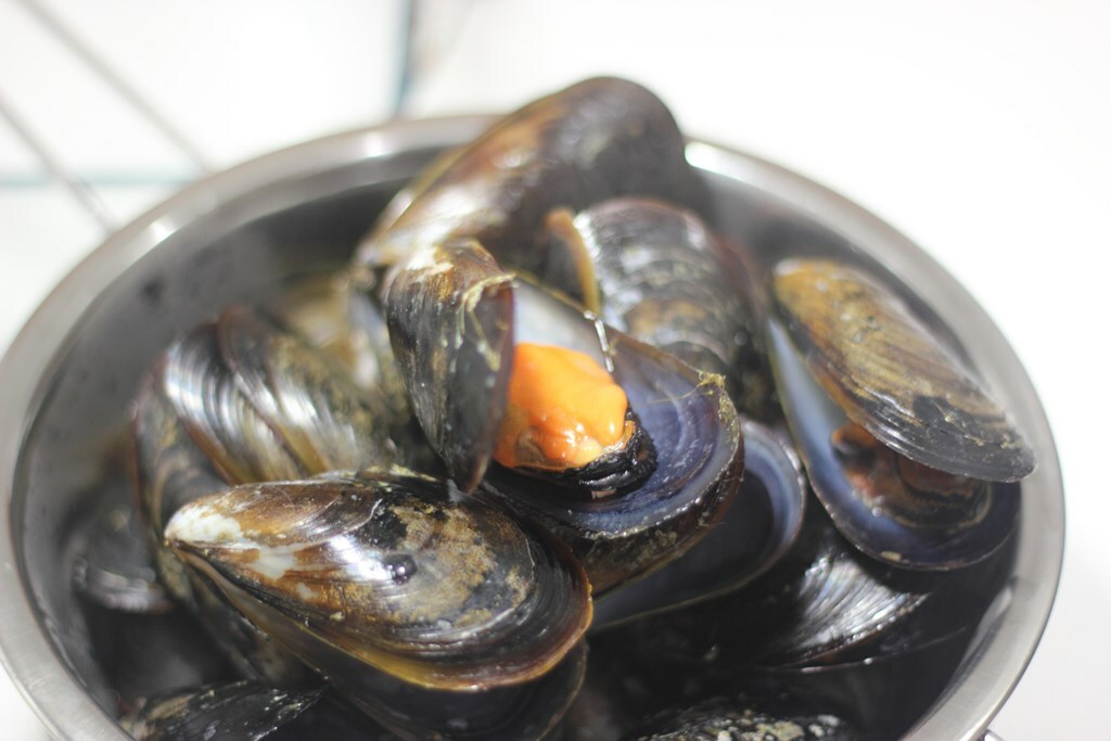Mejillones escurriendo