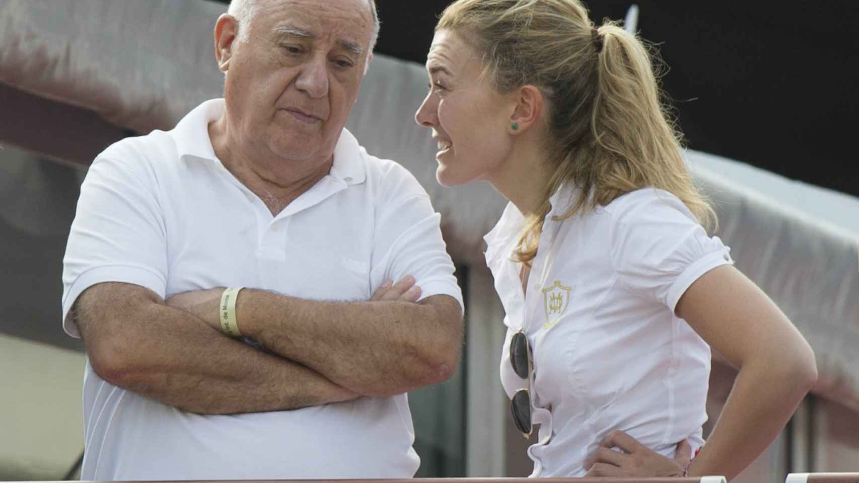 Amancio Ortega Gaona, junto a su hija Marta.