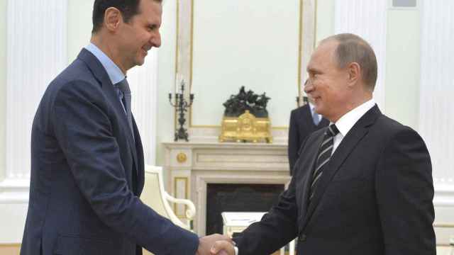 Asad con Putin, en una imagen de archivo.