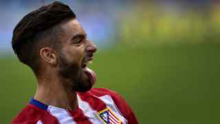 Carrasco celebra su gol contra el Valencia / Reuters