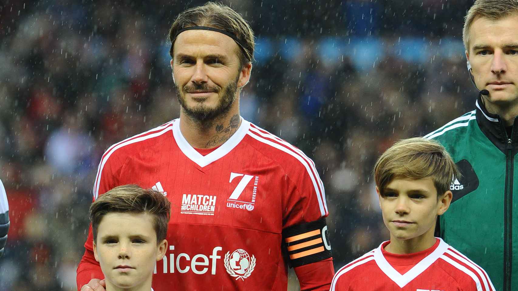 David Beckham con Cruz, Romeo y Harper en el partido de UNICEF