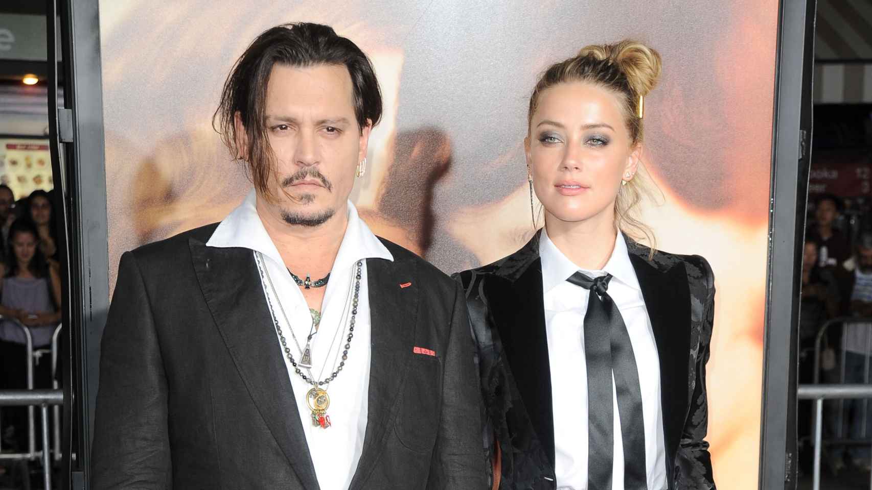 Johnny Depp con Amber Heard en la presentación de 'La chica danesa'
