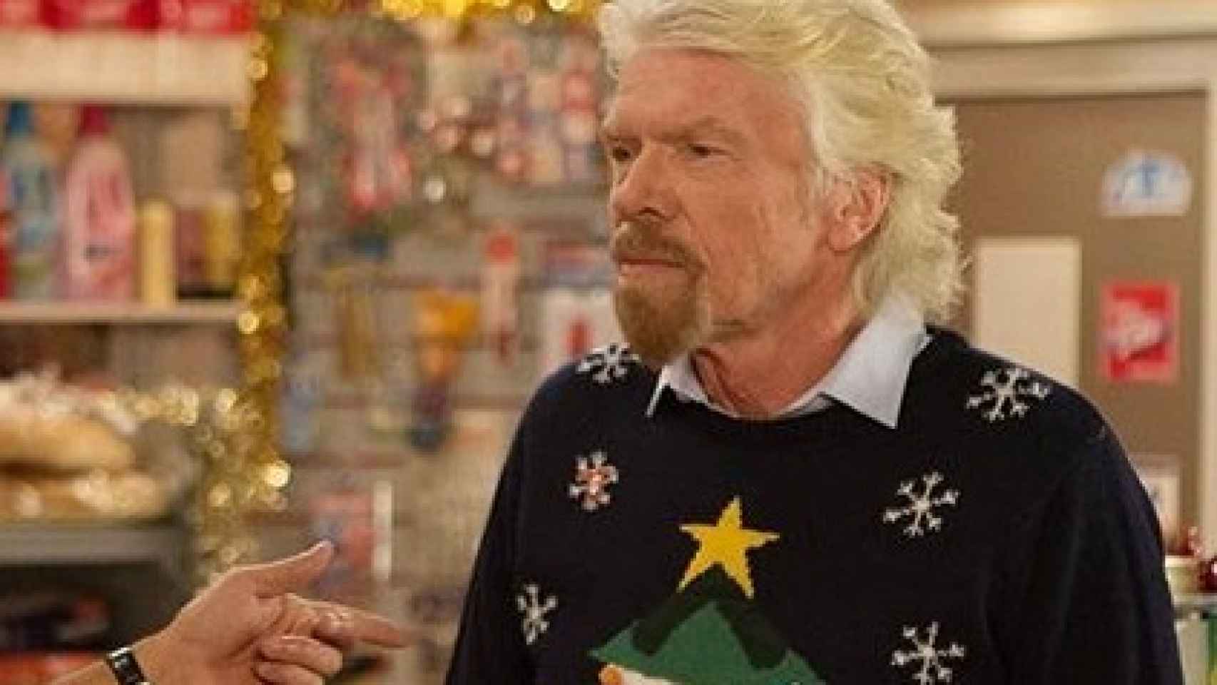 Richard Branson luce jersey navideño
