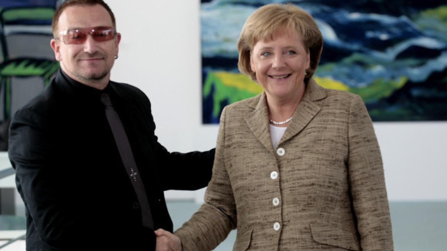Bono y Merkel mantienen una buena amistad