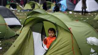 Un niño sirio en un campo de refugiados en la frontera entre Grecia y Macedonia