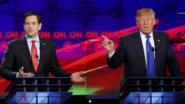 Los aspirantes republicanos Marco Rubio y Donald Trump.