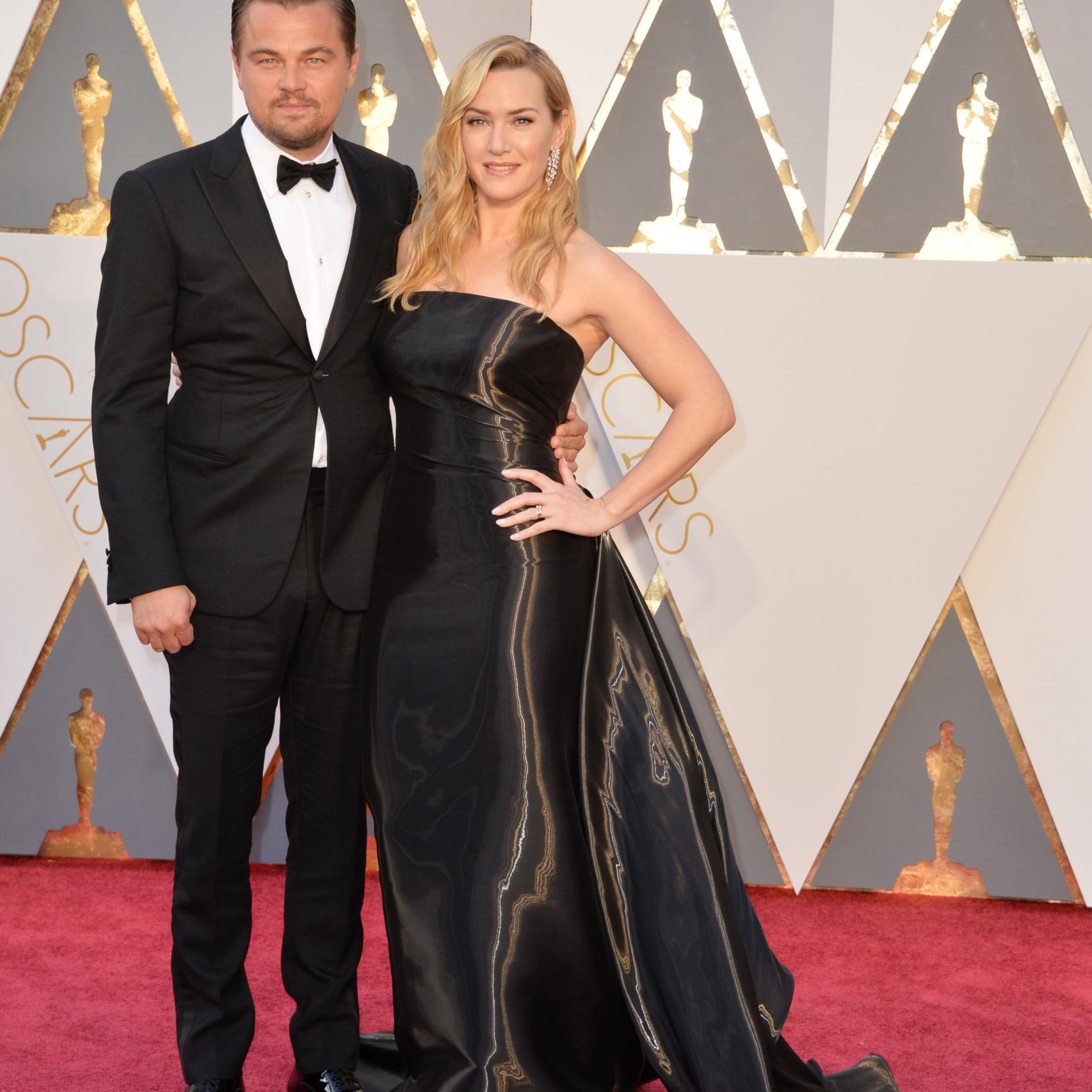 Kate Winslet de Ralph Lauren y Leonardo DiCaprio de Armani