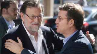 Rajoy saluda a Feijoo en Ponferrada.