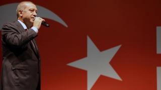 Handout photo of Turkish President Erdogan addressing his supporters outside of his residence in Istanbul