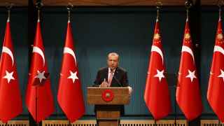 Turkish President Tayyip Erdogan speaks during a news conference at the Presidential Palace in Ankara