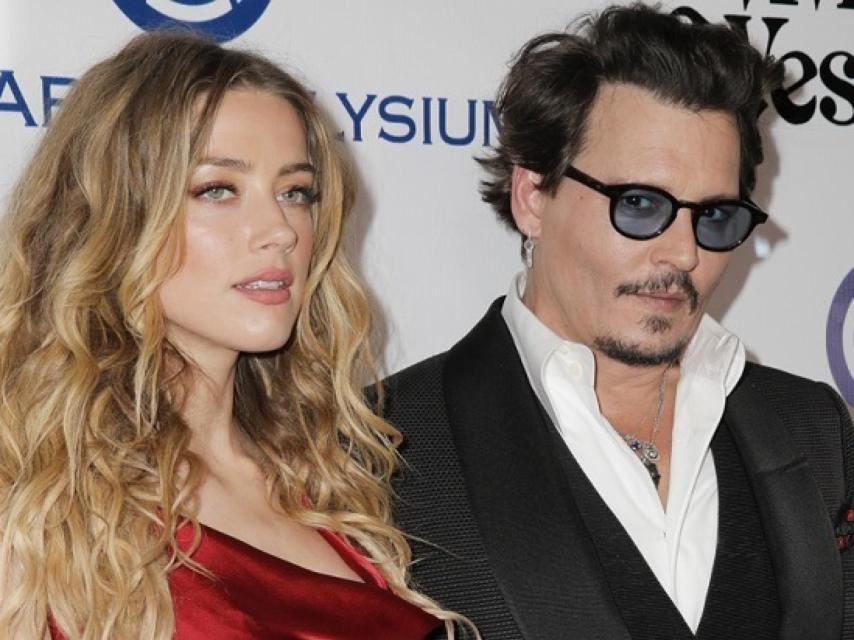 La ex pareja en el photocall de una fiesta