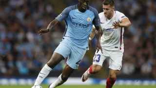 Manchester City's Yaya Toure in action with Steaua Bucharest's Ovidiu Popescu