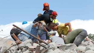 Rescuers work following an earthquake in Amatrice