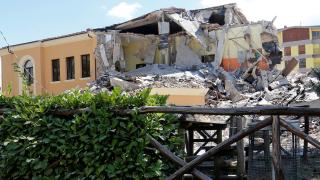 The school is seen partially collapsed following an earthquake in Amatrice