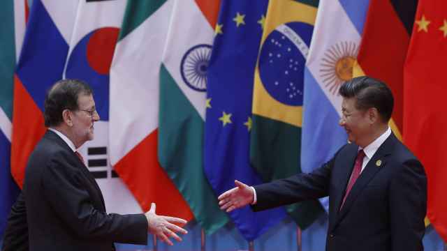 Mariano Rajoy saluda al presidente chino, Xi Jinping, al inicio de la cumbre del G-20.