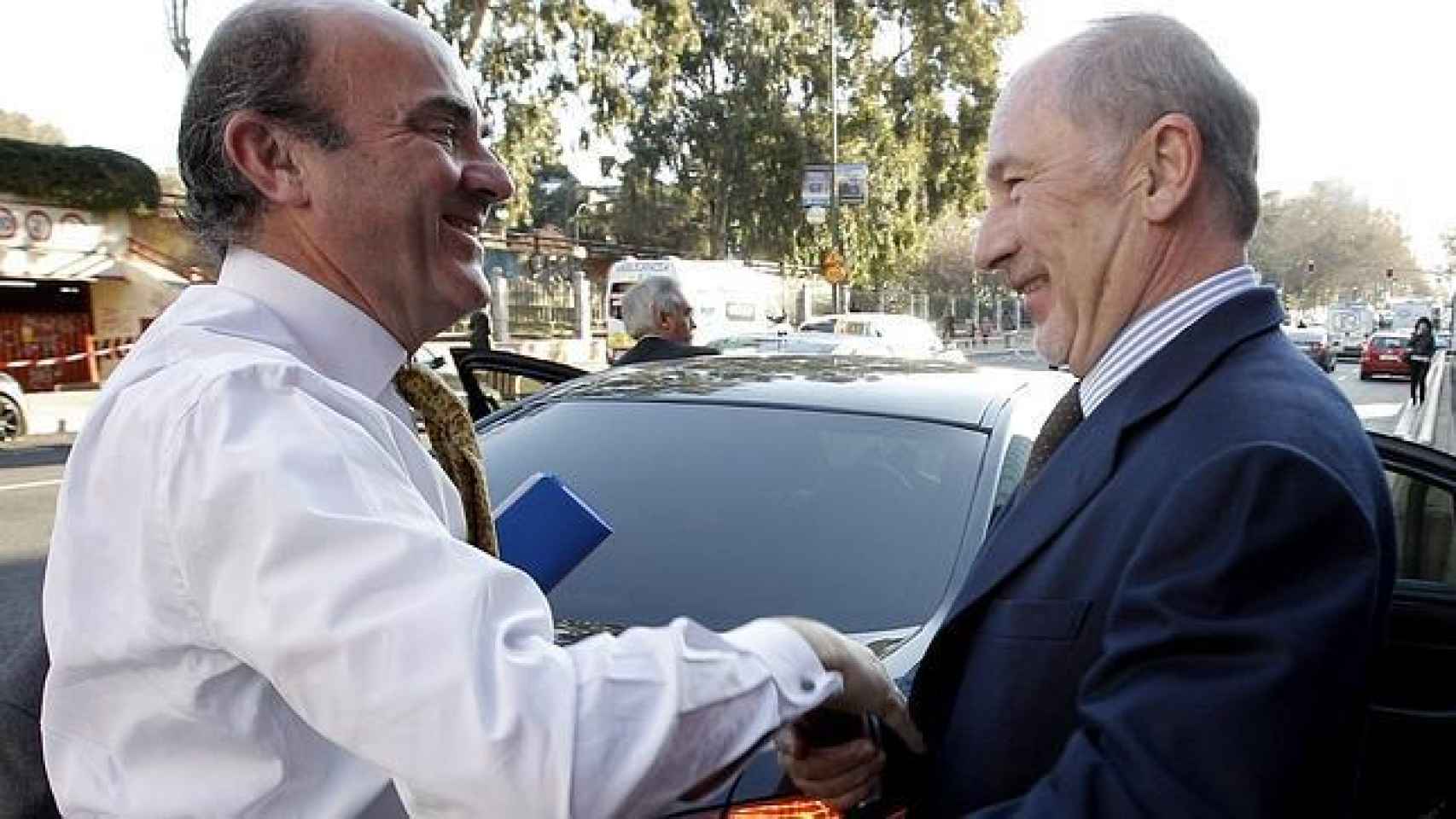 El ministro de Economía, Luis de Guindos, con Rodrigo Rato.