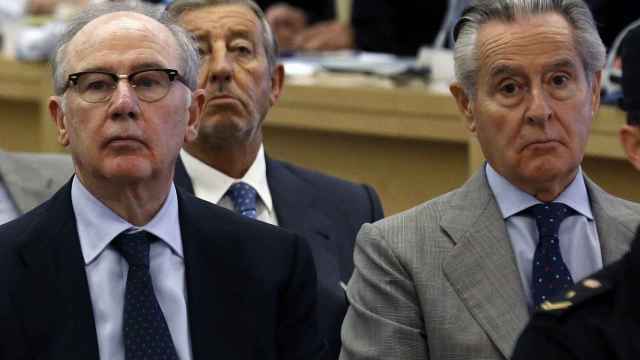 Los expresidentes de Caja Madrid y Bankia Miguel Blesa y Rodrigo Rato durante el juicio