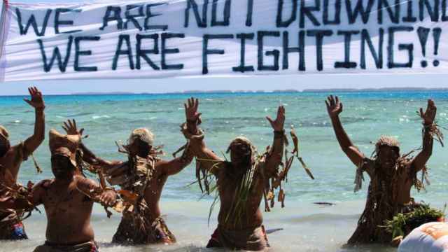 Habitantes de Tokelau protestan contra el cambio climático.