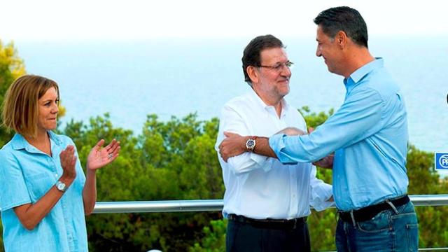 Rajoy presentando al candidato del PPC a las elecciones catalanas, Xavier Garcia Albiol, el verano pasado.