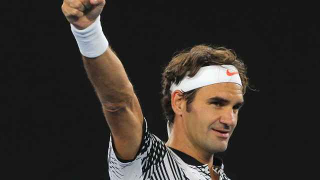 Roger Federer celebra su victoria ante Ferrer.