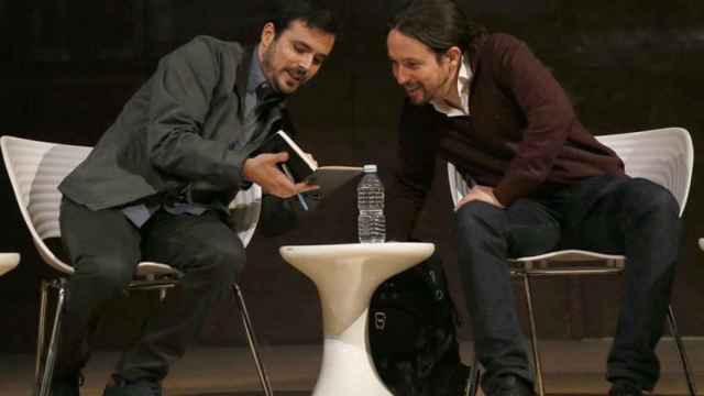 Alberto Garzón y Pablo Iglesias este viernes en Madrid.