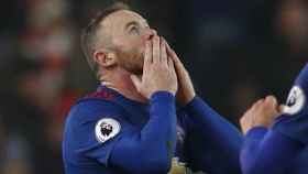 Manchester United's Wayne Rooney celebrates after scoring their first goal to break the all time goalscoring record for Manchester United