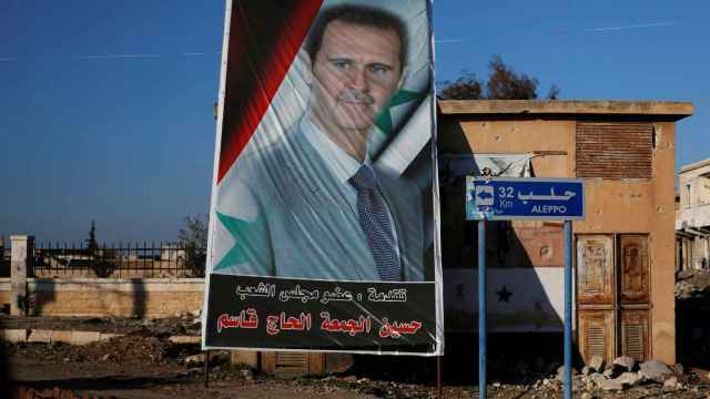 Un cartel del presidente sirio, Bashar al Asad, en un suburbio de Alepo.