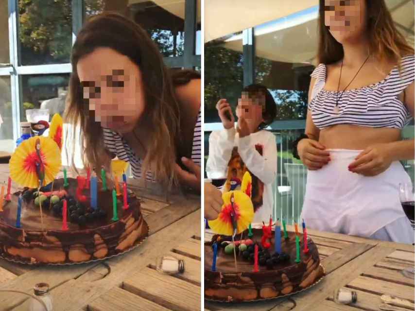 Dora sopla las velas de su tarta cumpleañera.