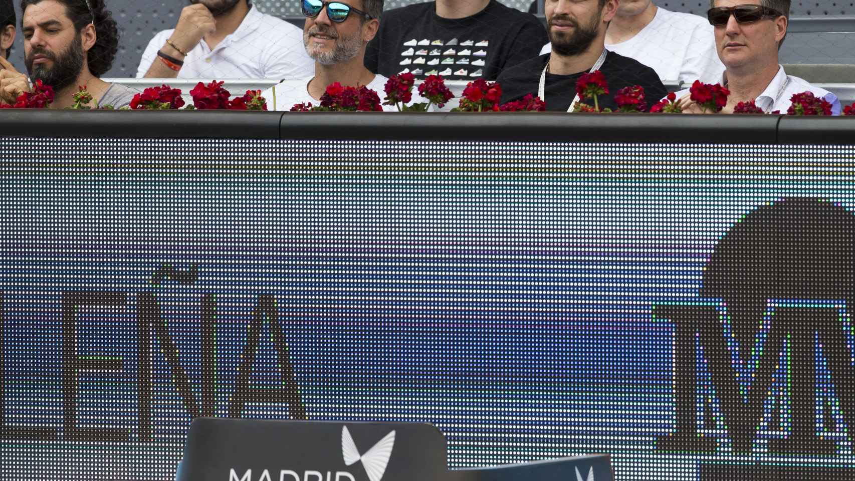 Piqué, viendo un partido en el Mutua Madrid Open.