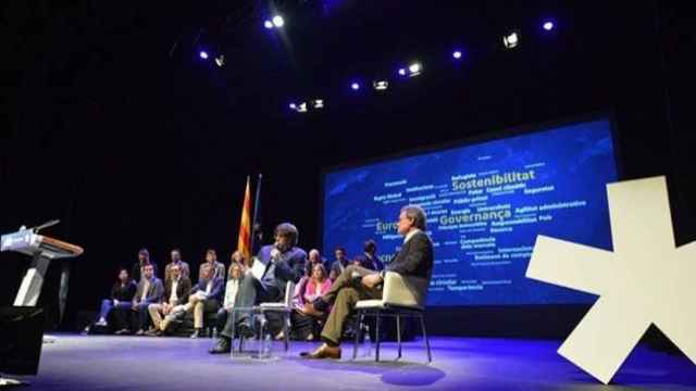 El presidente catalán, Carles Puigdemont y expresidente Artur Mas