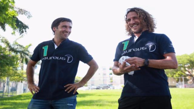 Raúl y Puyol en el acto solidario. Foto: Twitter (@LaureusSport).