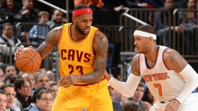 Lebron y Carmelo durante un encuentro de la NBA. Foto nba.com