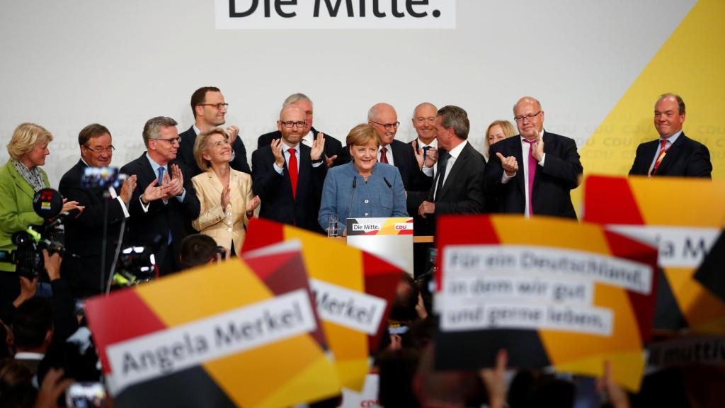 Merkel y los líderes de la CDU celebran la victoria.