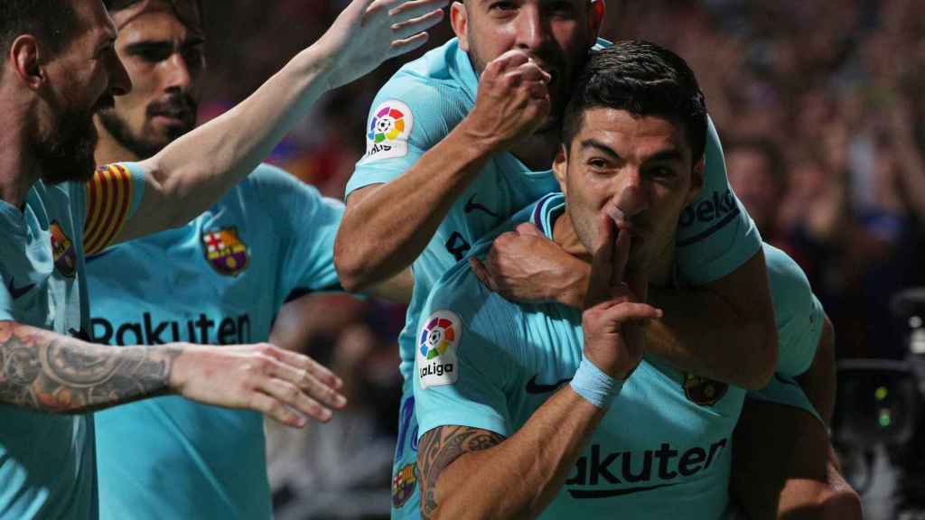Suárez celebra el gol del empate en el Metropolitano.