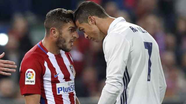 Koke y Cristiano se enzarzan en el último Atlético - Real Madrid de Liga.