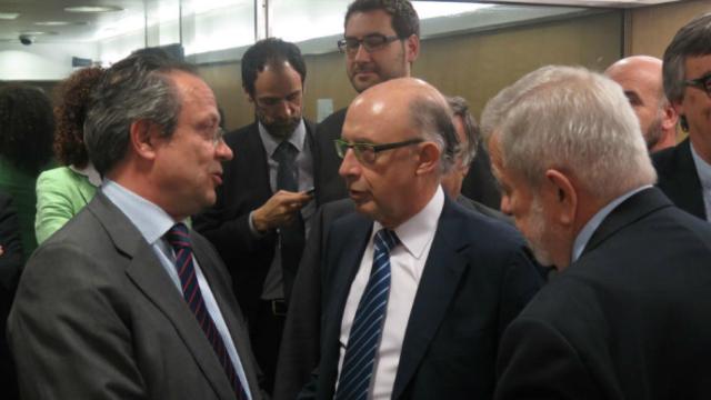 Ruiz Molina y el ministro Cristóbal Montoro en una imagen de archivo