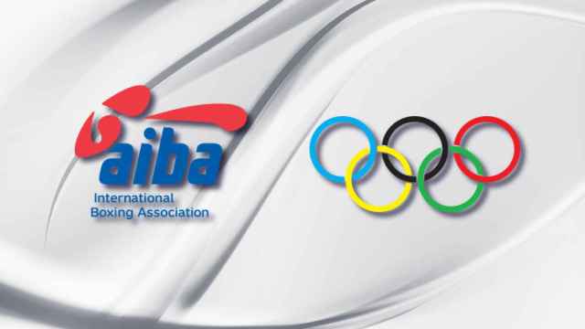 Logos de AIBA y del COI hermanados.