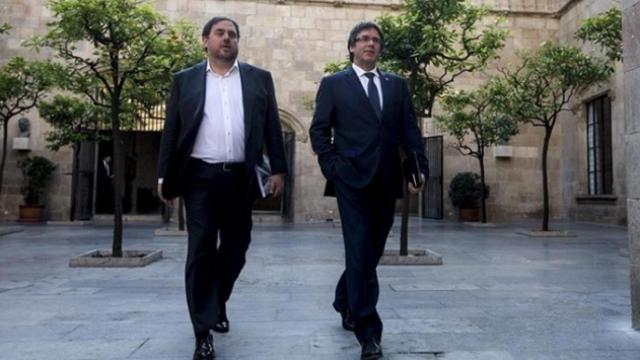 Oriol Junqueras y Carles Puigdemont acudiendo a un consejo de Gobierno.