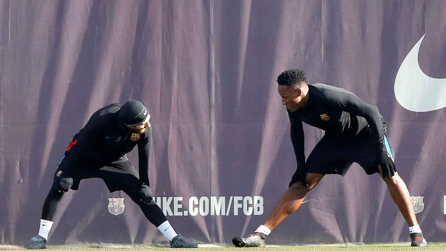 Leo Messi y Yerry Mina en el entrenamiento del Barcelona.