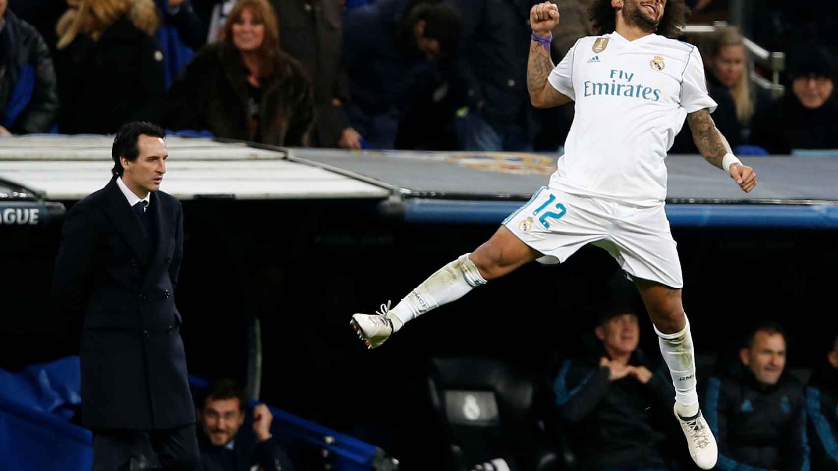 Marcelo celebra un gol del Real Madrid frente a Unai Emery.