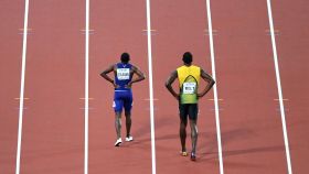 Christian Coleman y Usain Bolt tras la final de los 100 metros del Mundial 2017