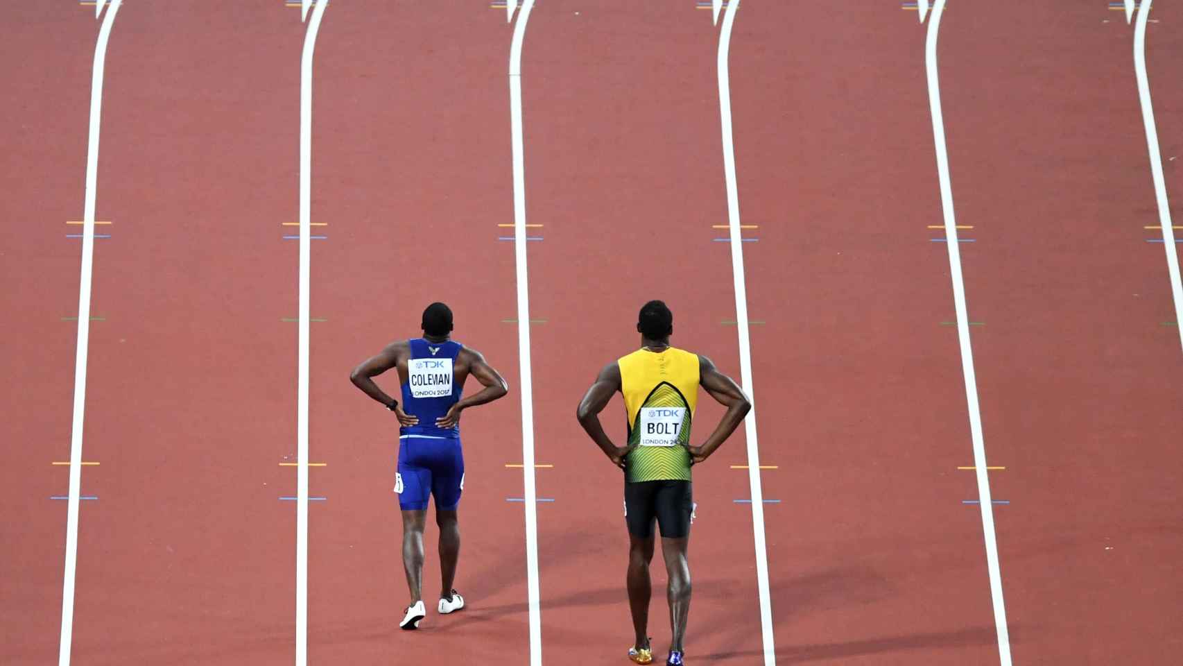 Christian Coleman y Usain Bolt tras la final de los 100 metros del Mundial 2017.