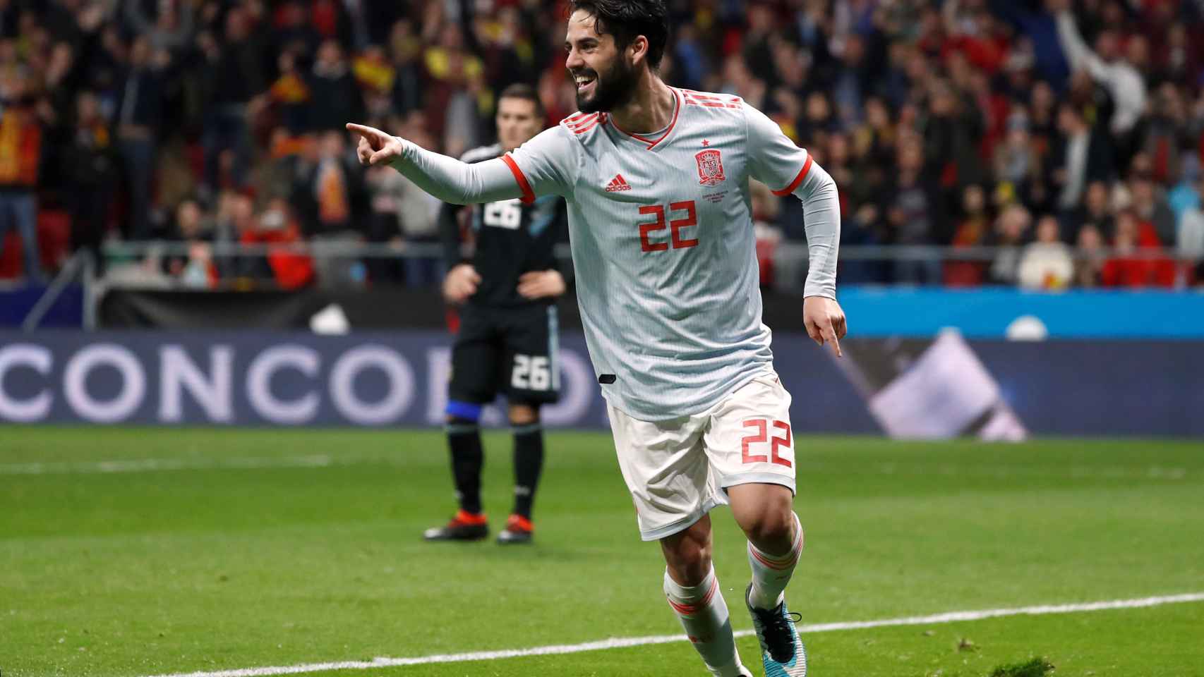 Isco celebra un gol con España.