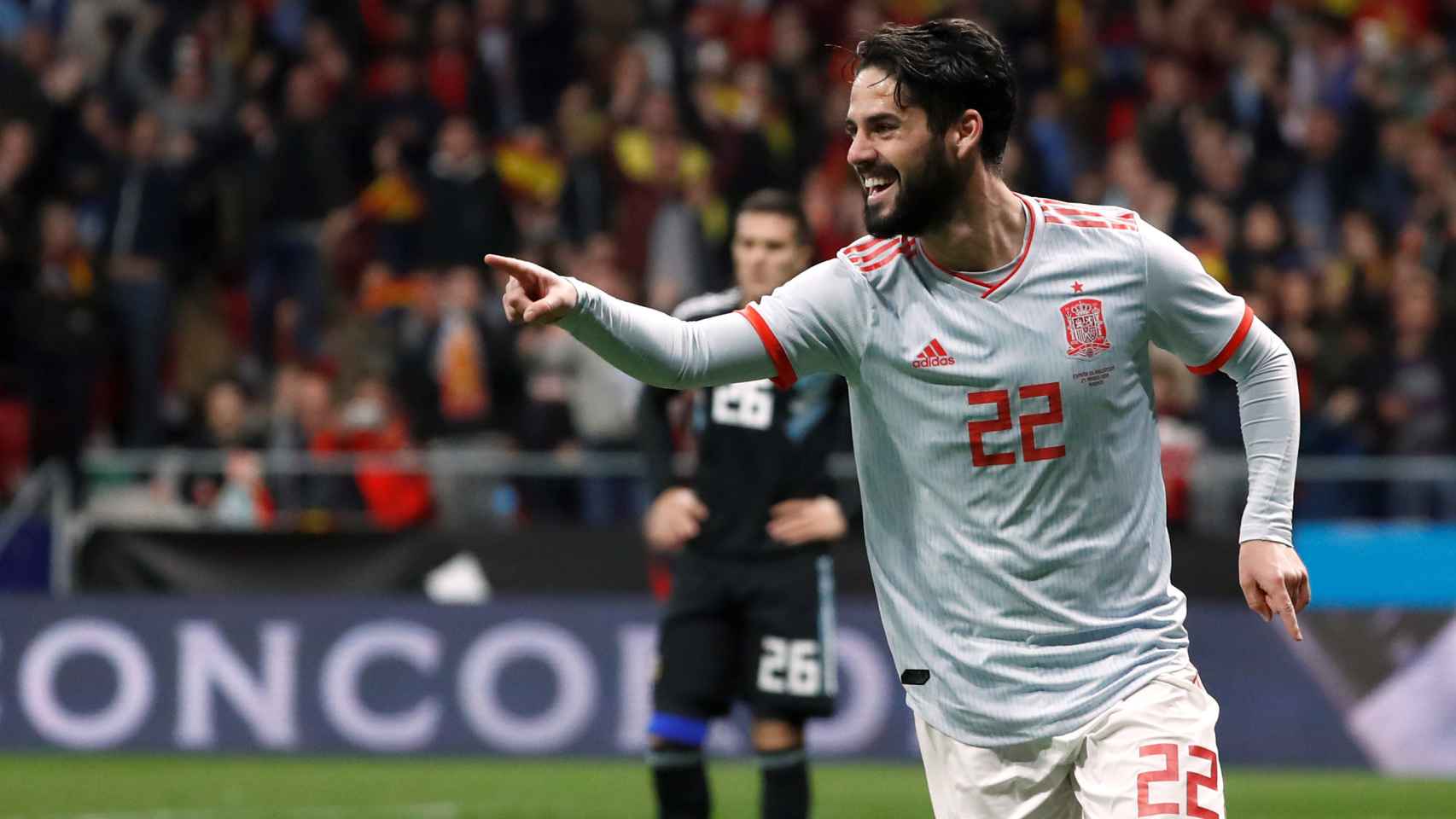 Isco celebra un gol con España.