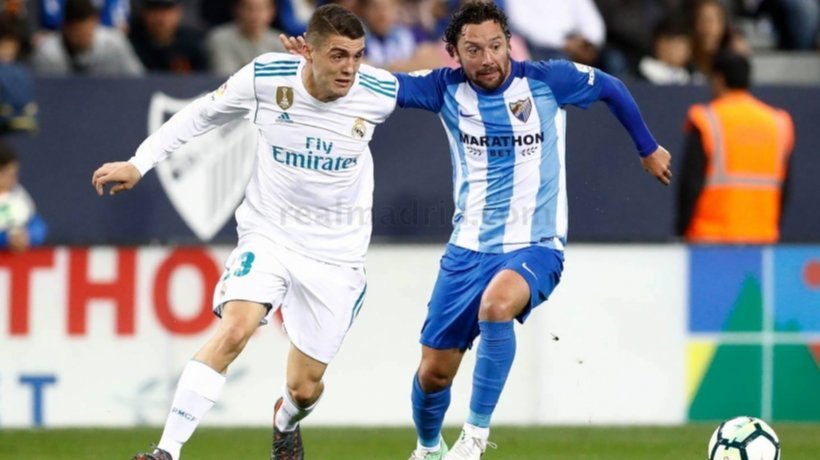 Kovacic contra un jugador del Málaga