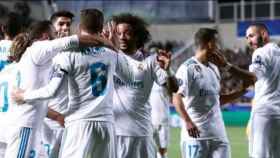 Varios jugadores del Real Madrid celebran un gol en Champions League