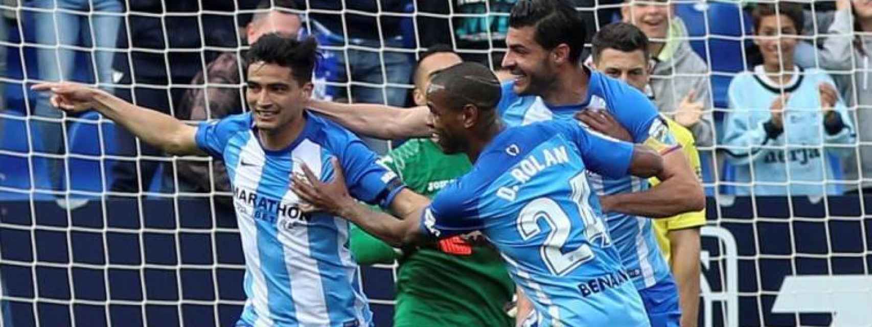 Los jugadores del Málaga celebran un gol.