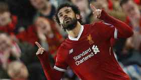 Salah celebra uno de los goles en el Liverpool - Roma.