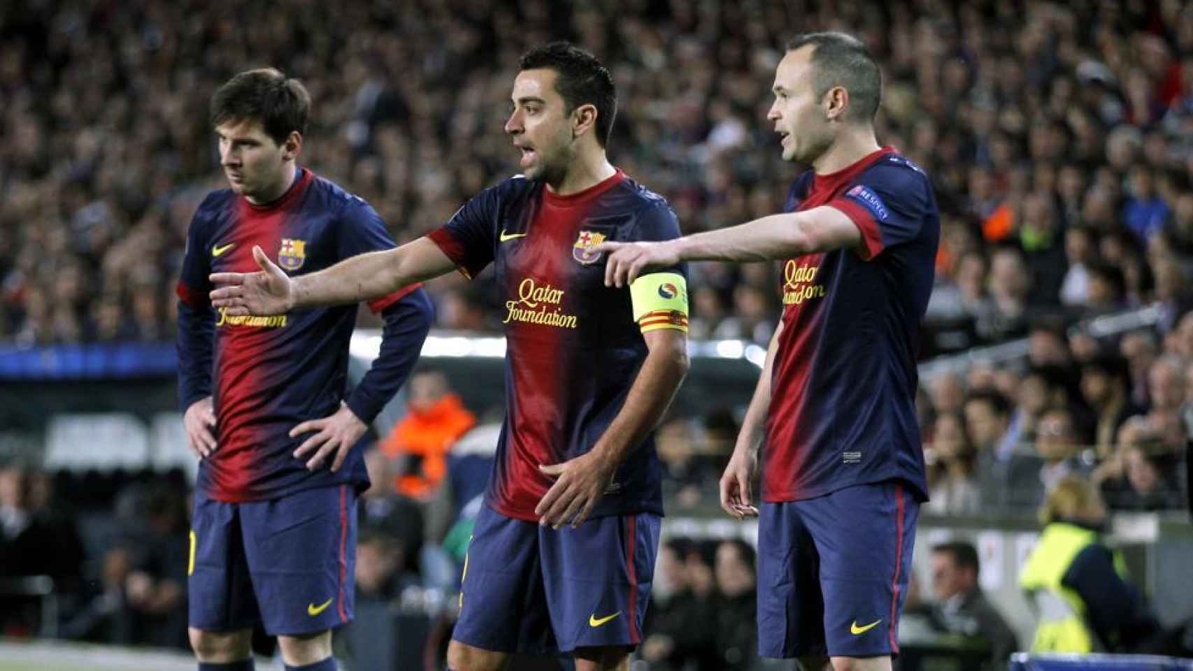 Messi, Xavi e Iniesta.